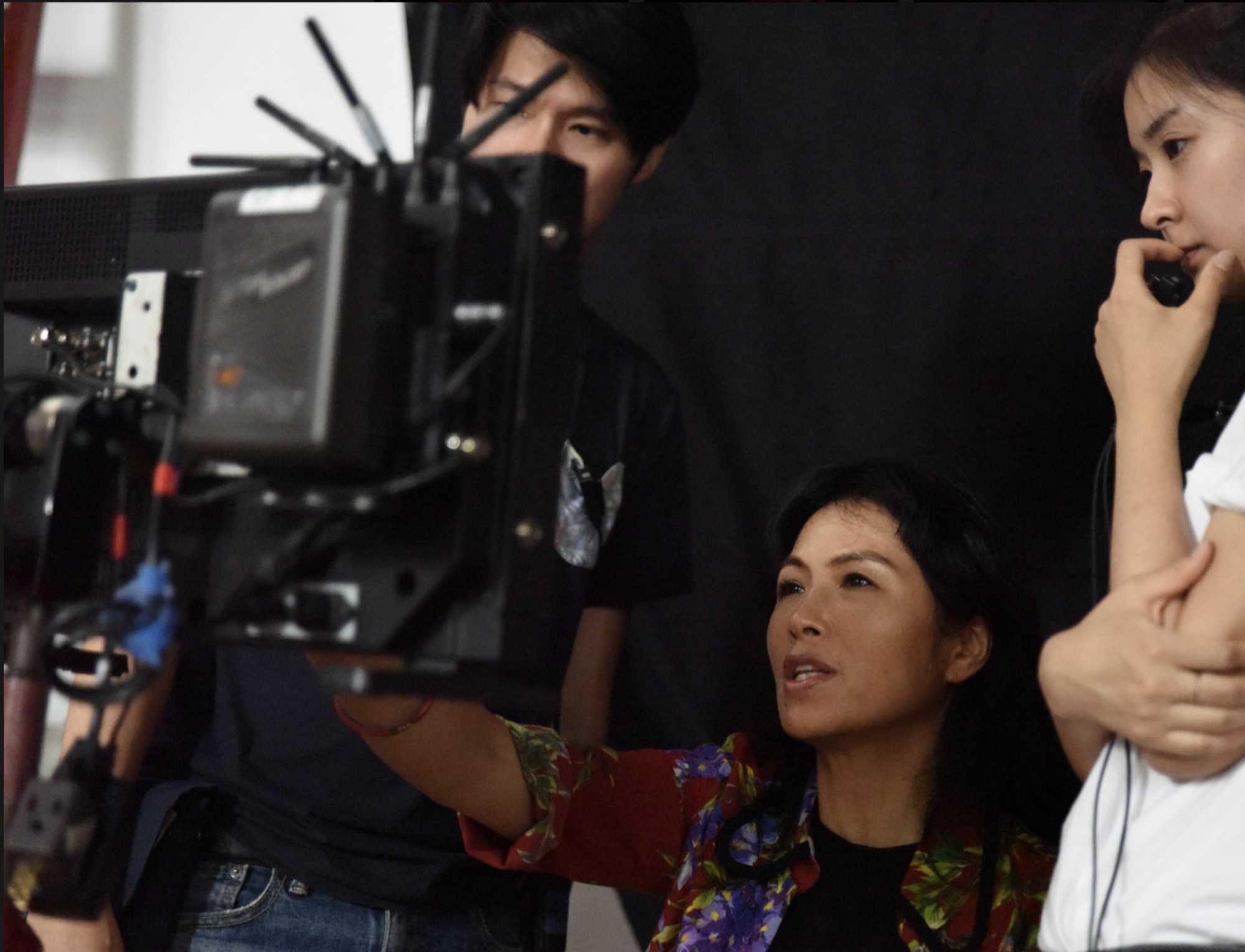 Grace Chang at work on a film set beside the camera department