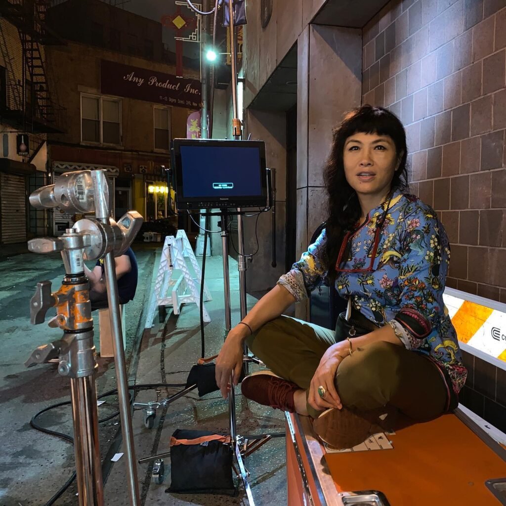 Grace Chang on film set with production equipment